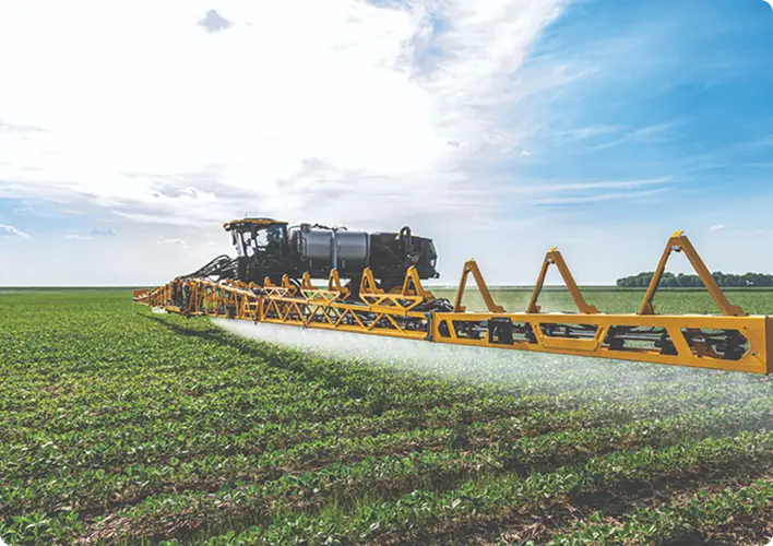 Machine spraying in a field